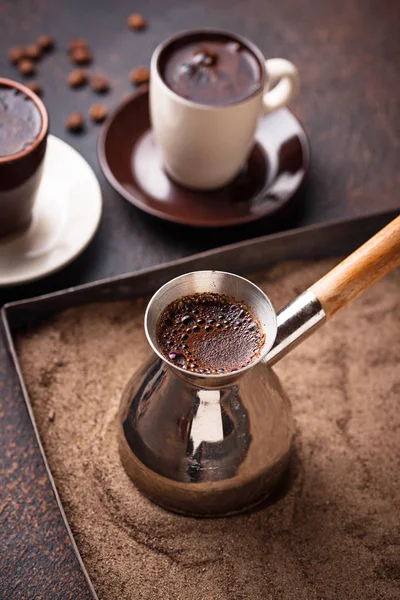Traditional turkish coffee prepared on hot sand — Stock Photo, Image