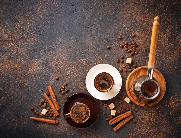 Cups of coffee, beans, sugar and cinnamon — Stok Foto