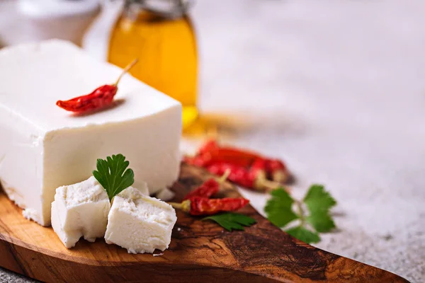 Fresh feta cheese with spices — Stock Photo, Image