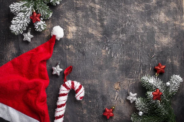 Natale sfondo scuro con cappello Babbo Natale — Foto Stock