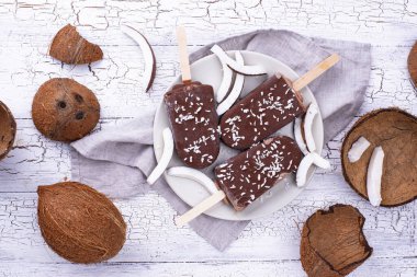 Coconut popsicles in chocolate glaze