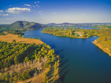 Lake Burley Griffin and iconic Telstra Tower at sunset. Canberra, ACT, Australia clipart