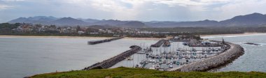 Panoramic landscape of Coffs Harbour international marina and coastline. clipart