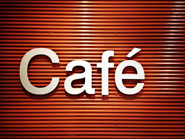 Élégant Panneau Café Sur Fond Métallique Rouge Gros Plan Image — Photo
