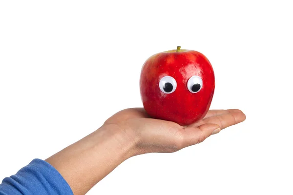 Weibliche Hand Mit Rotem Apfel Mit Googly Augen Isoliert Auf — Stockfoto