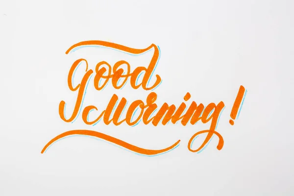 Good Morning ! Brush lettering hand written phrase design in orange color on white background