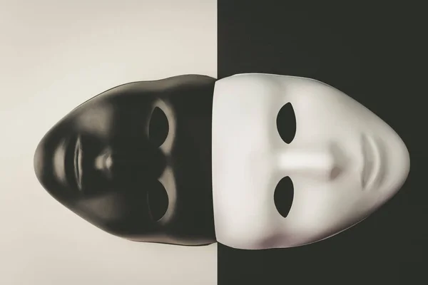 Siyah ve beyaz maskeler birbiriyle zıt arka planda birleşir. Anonimlik kavramı.