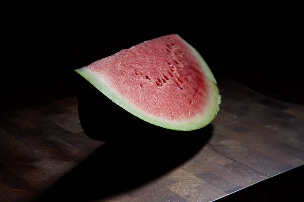 Watermelon Slice Chopping Board Extreme Closeup Black Background Harsh Light — Stock Photo, Image