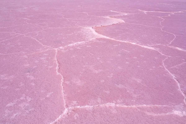 Closeup of windblown salt patterns of a pink lake in Australia