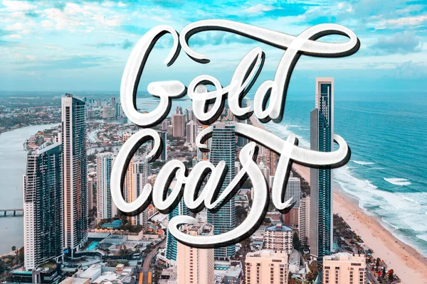 Gold Coast spray paint lettering over aerial photograph of Gold Coast city at sunset in Queensland, Australia