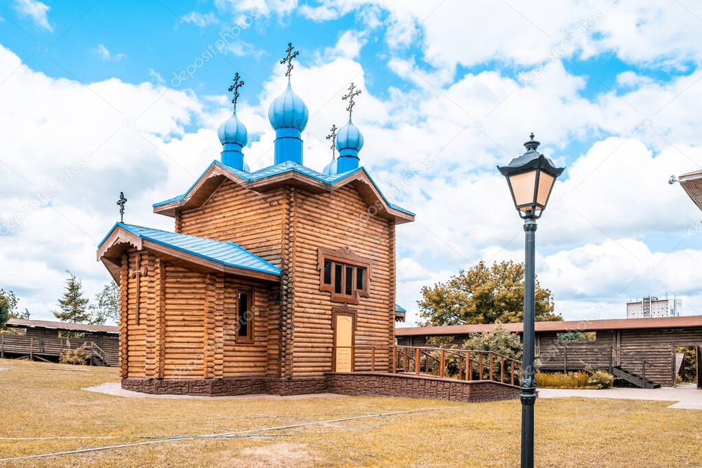 Little wooden church with blue domes in Mazyr Castle, Belarus