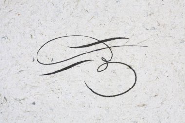 Kraft kağıdına mürekkeple yazılmış güzel bir resim.