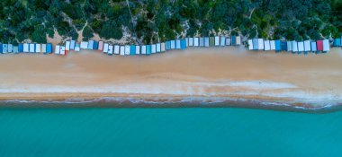 Aerial panorama of long row of beach huts and beautiful turquoise water in Melbourne, Australia clipart