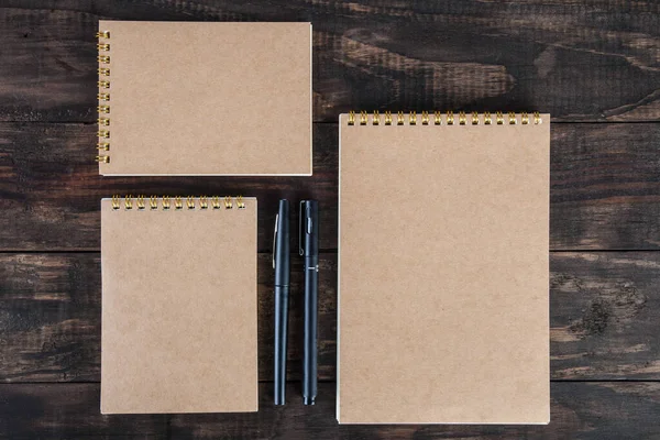 Set Three Spiral Notepads Two Black Pens Wooden Table Top — Stock Photo, Image