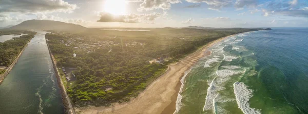 Beautiful aerial landscape of ocean coastline at sunset in Australia