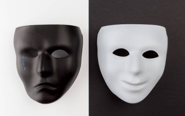 Mutlu ve üzgün duyguları ifade eden tiyatro maskeleri. Depresyon duygusal konsepti.