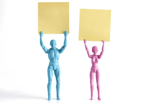 Male Female Figurines Holding Yellow Paper Notes Heads Isolated White — Stock Photo, Image