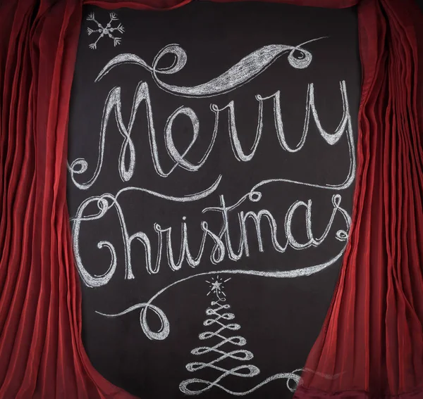 Feliz Navidad Dibujado Mano Con Tiza Pizarra Enmarcada Por Cortinas —  Fotos de Stock
