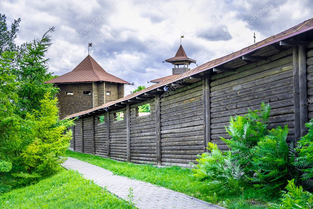 Traditional log fence around the Mazyr Castle in Belarus