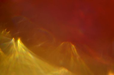 Kırmızı ve sarı parlayan soyut arkaplan