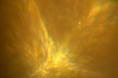 Odaklanamayan sarı parlayan soyut arkaplan