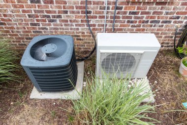 HVAC Air Conditioner Compressor and a Mini-split system together clipart