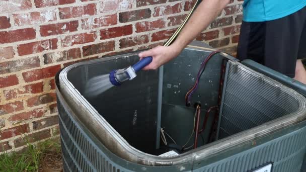 Cleaning Air Conditioner Condenser Coil — Stock Video