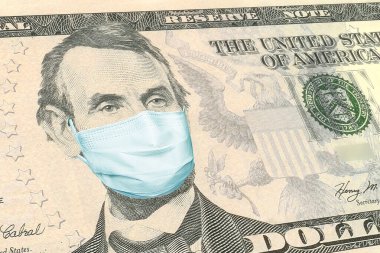 Lincoln 'ün maske taktığı 1 dolarlık banknotlar. Birleşik Devletler 'de koronavirüs salgını. Coronavirüs salgınının Birleşik Devletler ekonomisi üzerindeki etkisi. Koronavirüs salgınının etkisi