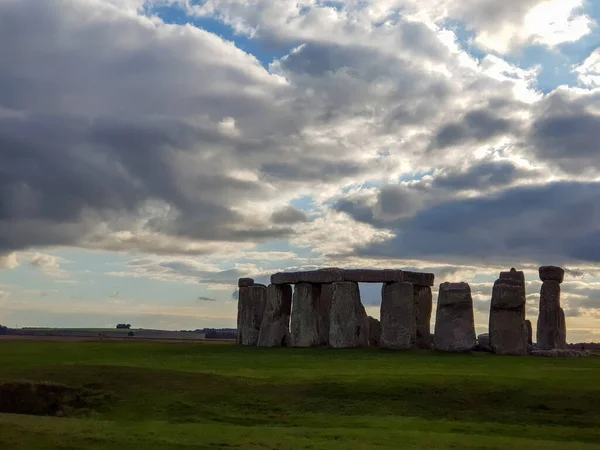 Stonehenge an ancient prehistoric stone monument near Salisbury with dramatic sky, Wiltshire, UK. in England