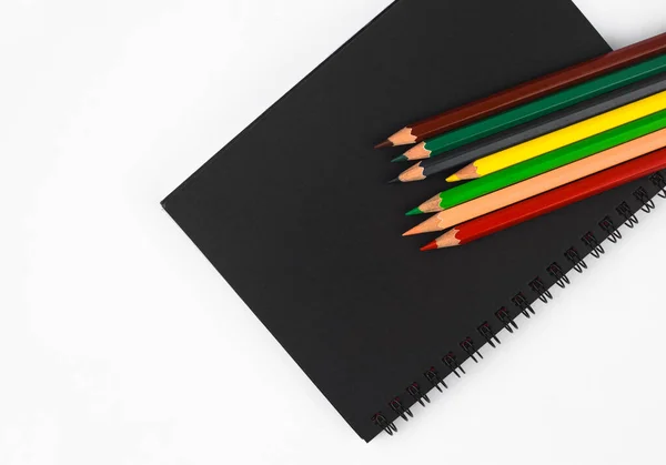 Some Different Colored Pencil Crayons Scattered Top Isolated Black Paper — Stock Photo, Image