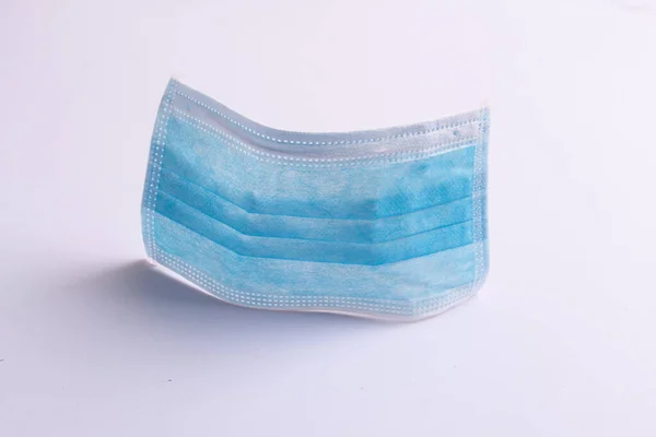surgical mask to cover the mouth and nose. Procedure mask from bacteria. Protection concept.