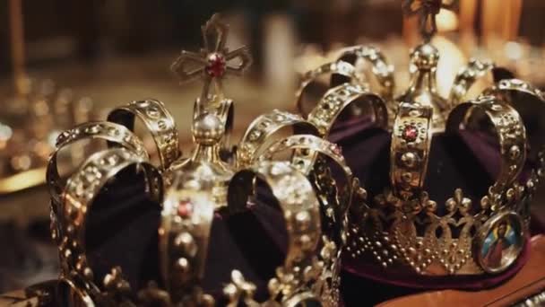 Church Pedestal Two Beautiful Golden Crowns Wedding Depict Virgin Mary — Stock Video