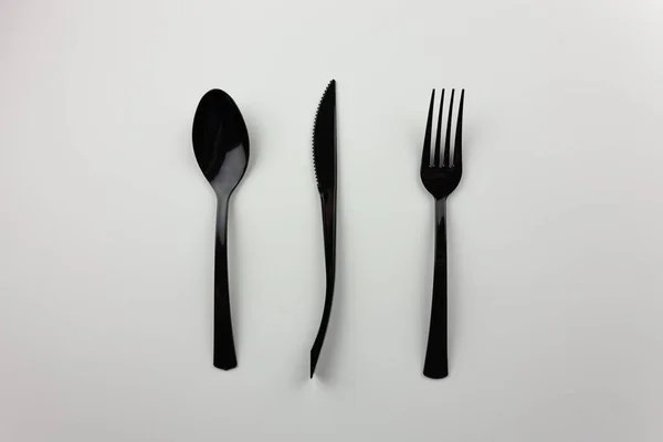 Πλαστικά Αντικείμενα Μαύρες Συσκευές Για Φαγητό Για Την Παρουσίαση Της — Φωτογραφία Αρχείου