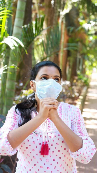 Protect from coronavirus, Corona prevention concept, Girl with mask against coronavirus