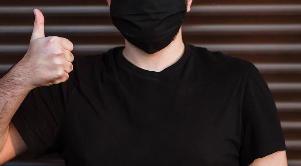 Young Man Black Shirt Mask Isolated Dark Wall Background Healthy — Stock Photo, Image