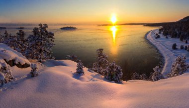 Winter on lake Ladoga. Karelia. Russia clipart