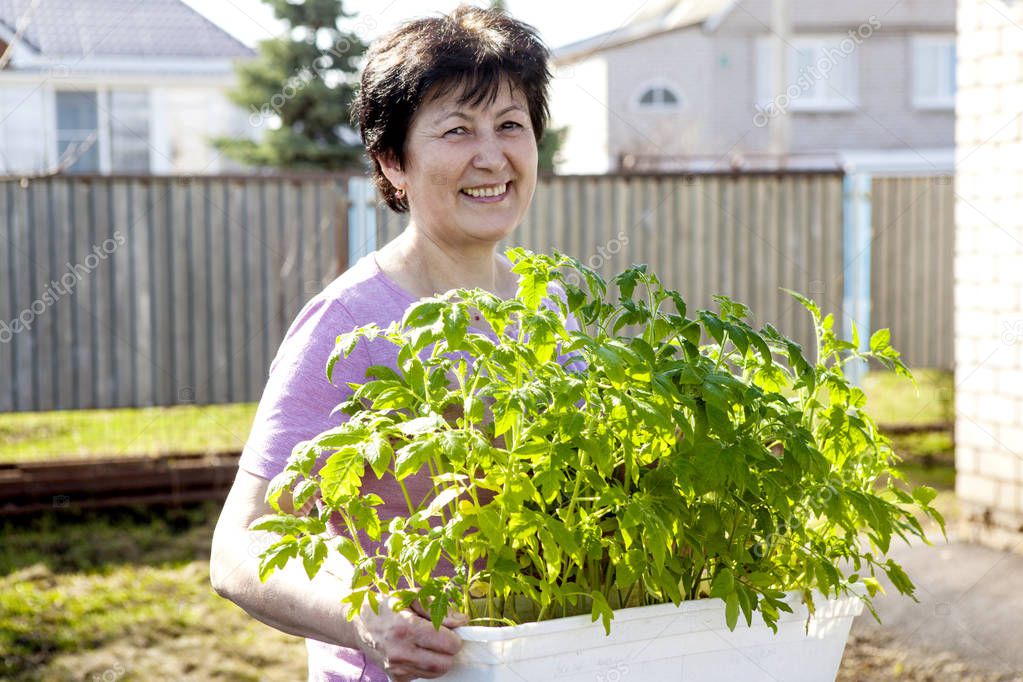 Woman with sprouts in hands