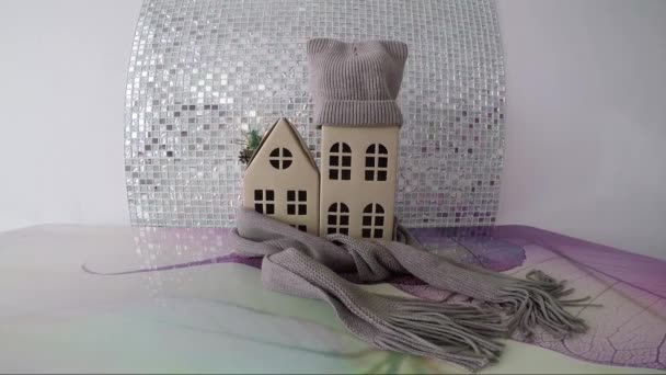 Cardboard houses in a scarf and hat. Housing. The property — Stock Video