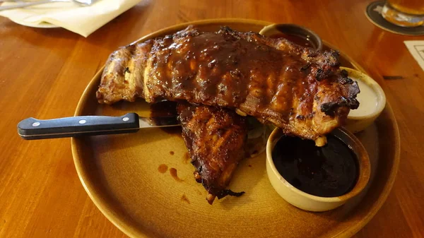 Rack Delicious Baby Back Ribs Barbecue Sauce French Fries Coleslaw — Stock Photo, Image