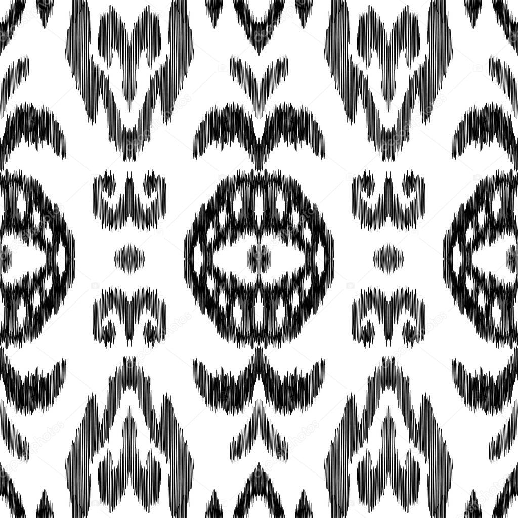 Ikat seamless pattern in damask, oriental, indian, marrocan style. Vector background. Black and white texture graphic. Ethnic design for fashion textile prints, wallpapers, cards or wrapping papers.