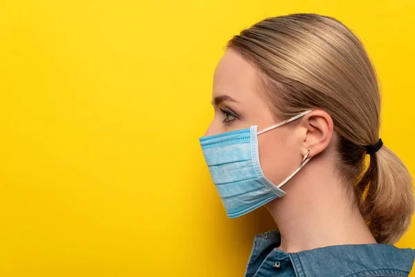 Side View Young Woman Medical Mask Yellow Background Coronavirus Concept — Stock Photo, Image