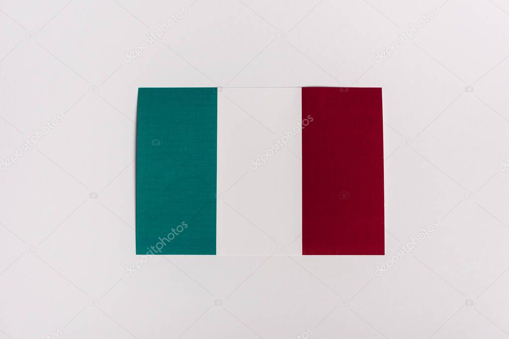 top view of Italian flag on white background, coronavirus concept