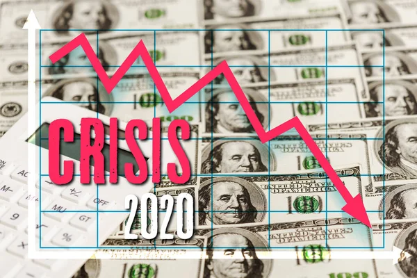 Calculatrice sur les billets en dollars, concept de crise coronavirus 2020 — Photo de stock