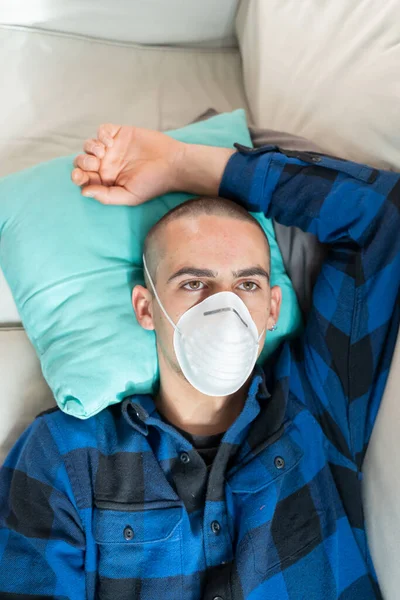 Coronavirus Man Home Wearing Protective Mask Woman Quarantine Coronavirus Couch — Stock Photo, Image
