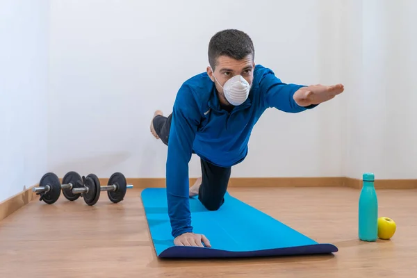 Coronavirus Covid Young Man Doing Sport Home Quarantine Mask Protection — Stock Photo, Image
