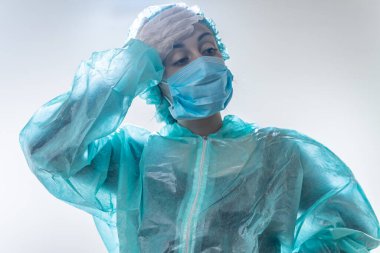 Coronavirus. Hastanede çalışıp koronavirüsle savaşan doktor ve hemşirelere teşekkür ederim. Doktorlar kahramandır. Koruyucu giysili ve maskeli doktorlar hastalığın tedavisini arıyorlar.. 