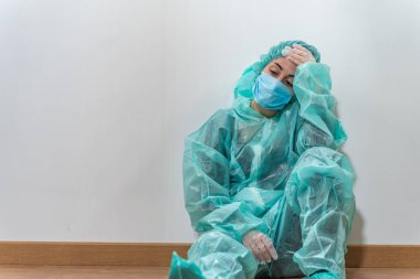 Coronavirus. Hastanede çalışıp koronavirüsle savaşan doktor ve hemşirelere teşekkür ederim. Doktorlar kahramandır. Koruyucu giysili ve maskeli doktorlar hastalığın tedavisini arıyorlar.. 