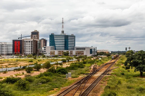 Railroad and rapidly developing central business district, Gabor — Stock Photo, Image