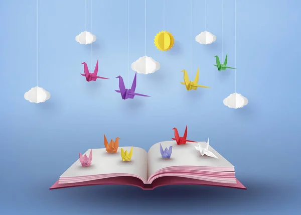 Origami tehty värikäs paperi lintu lentää yli avoin kirja — vektorikuva
