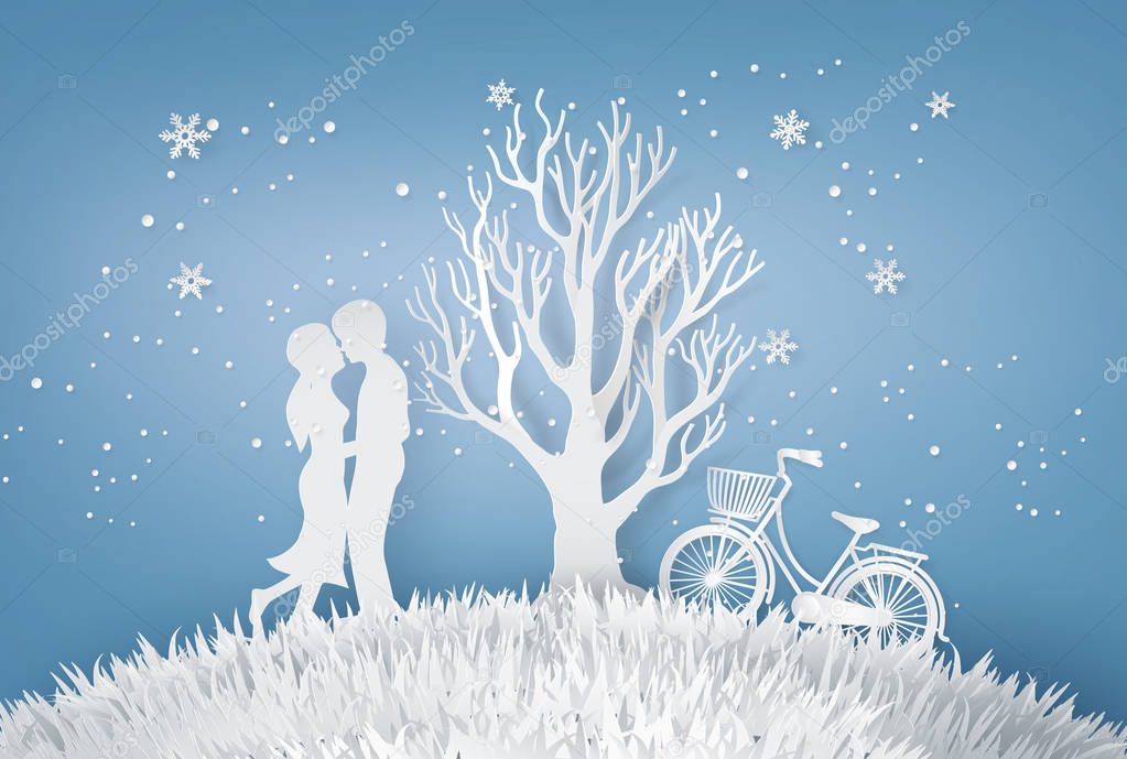 Lovers are hugging  In a meadow with tree without leave.